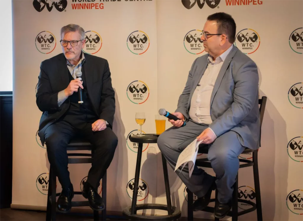 Pictured left to right, Paul Bauer, president of Miller Environmental Corporation, and Andre Brin, CEO of WTC Winnipeg, on stage at WTC Winnipeg's business networking event, WTC Talks, on February 11, 2026.