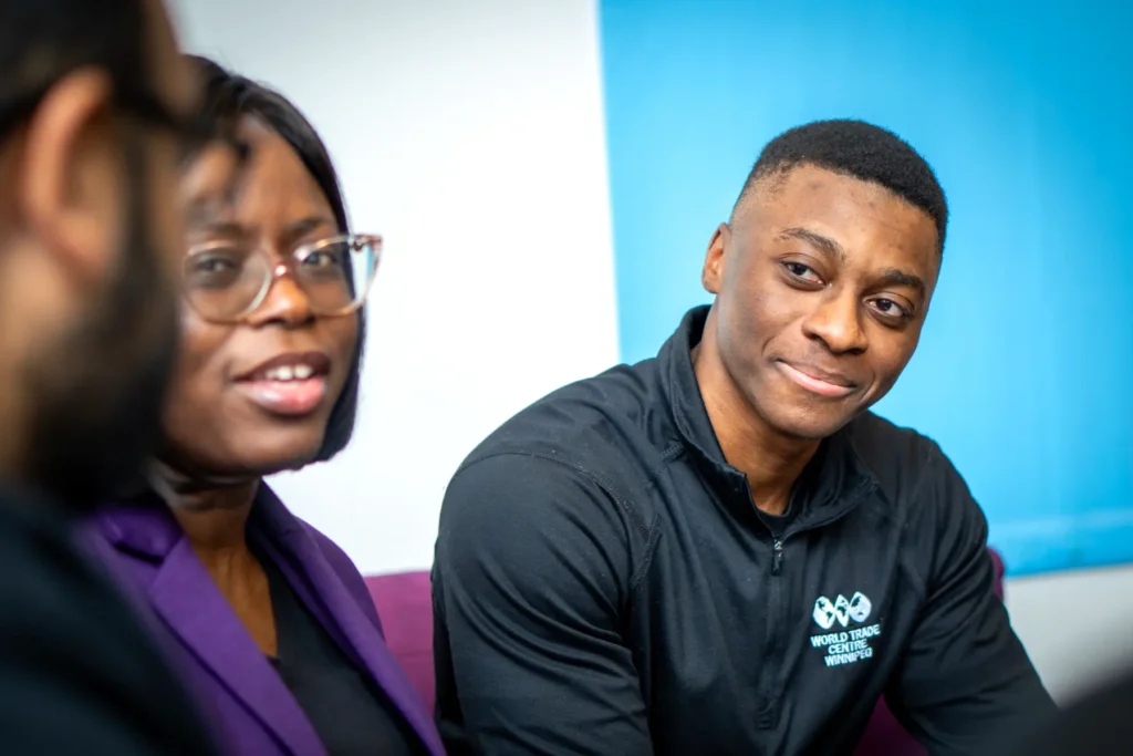 Éric speaks with fellow Trade Advisor Yewande Olubowale at the WTC Winnipeg office for an introduction to Market Intelligence webinar.